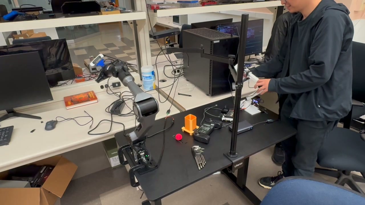 AgileX PiPER robot arm in the PRACTICE Lab workspace at UCLA